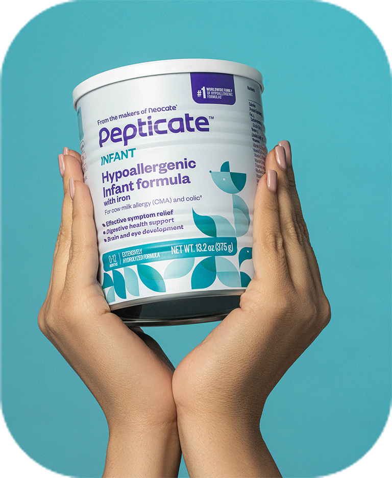 Hands holding a can of Pepticate formula