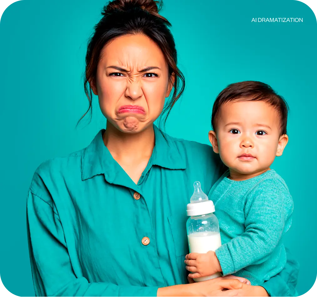 A mom who is making an unpleasant face and holding a baby with a baby bottle. 
